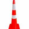 Close-up of a bright orange traffic cone with a reflective white band, viewed from the tip downward