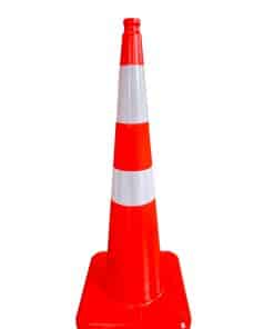 Close-up of a bright orange traffic cone with a reflective white band, viewed from the tip downward